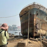 Standing well back from the action to photograph the ship breaking yards in Bangladesh (image by Yousuf Tushar)