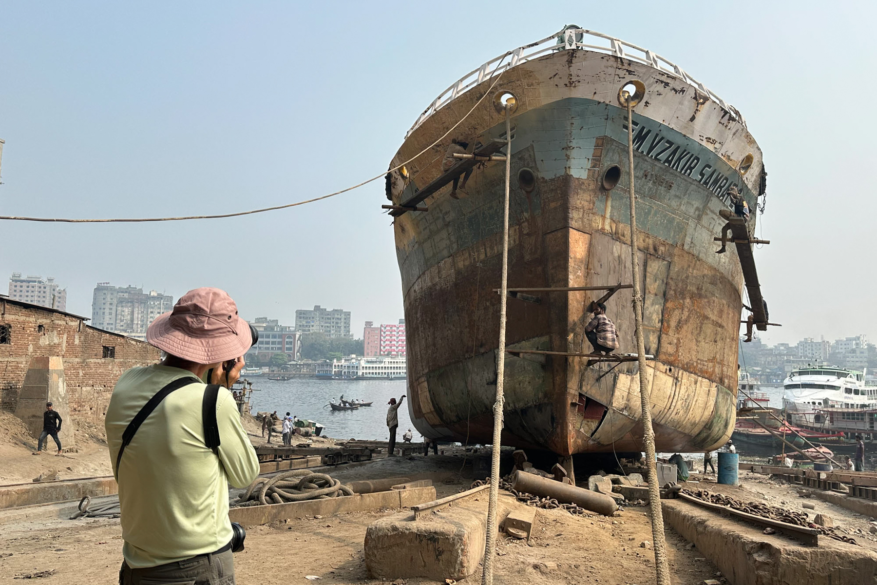 Standing well back from the action to photograph the ship breaking yards in Bangladesh (image by Yousuf Tushar)