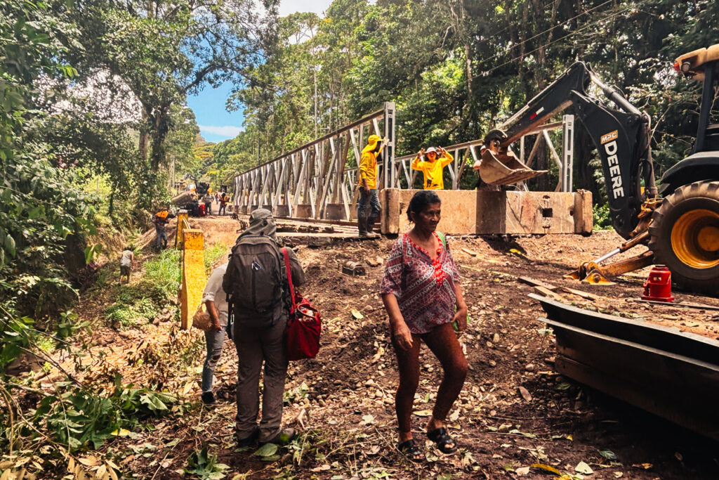 What's the point of a tour if there's not a little bit of adventure. A collapsed road bridge the previous day led to some hasty bridge repair - and a short river crossing (image by Gin Wilde)