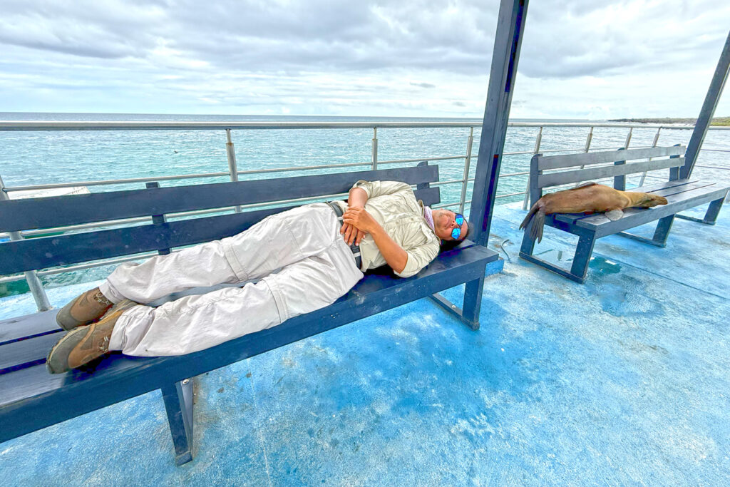 Our fabulous Galapagos National Park guide Jairo take a break with one of his pals (Image by Mike Watson)