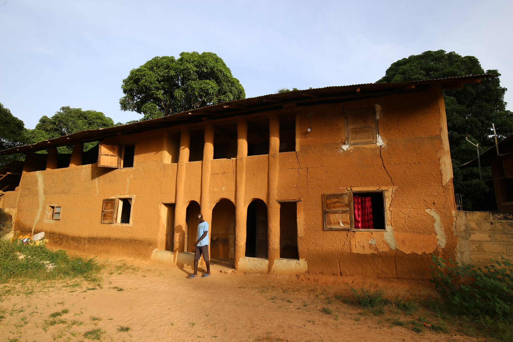 The traditional double story clay houses of Mlomp.