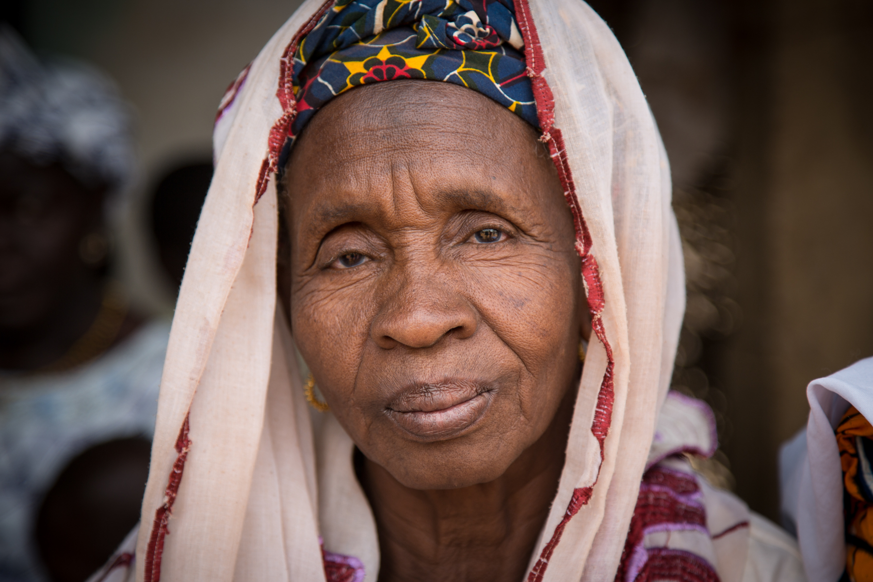 Elderly Fulani woman at the weekly market in Dindifelo, close to the border of Senegal and Guinea. (image by Inger Vandyke)