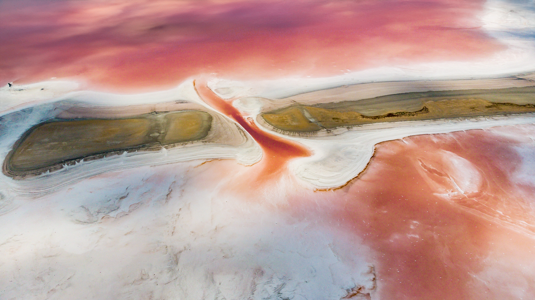 From the sky the pink salt pans of coastal Senegal look like another planet.