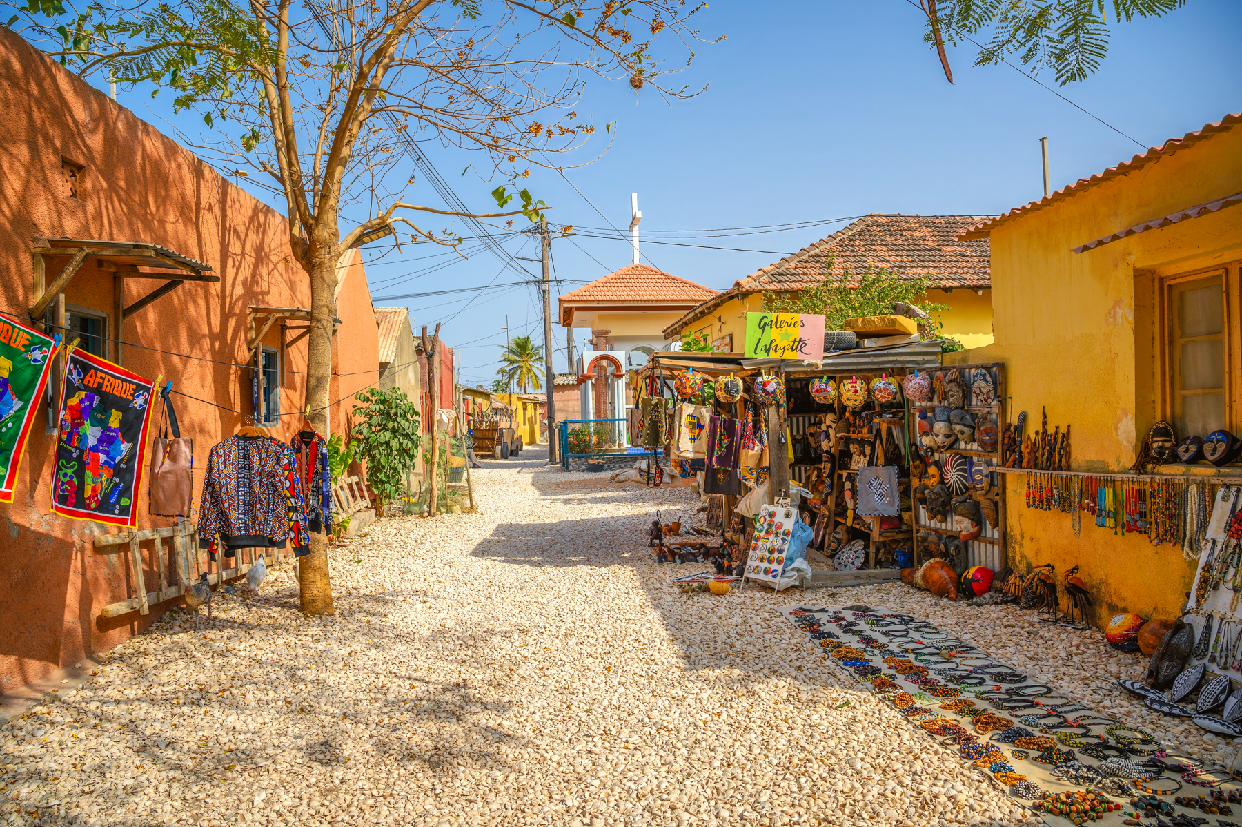 The colourful streets of Joal Fadiouth, a village built almost entirely on seashells from decades of cockle fishing.