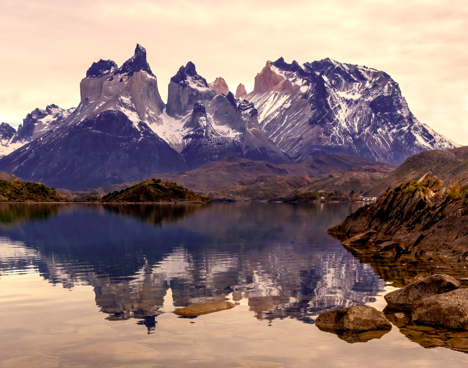 Warm reflections in some of the most spectacular mountains on earth (image by Wild Images guest Stuart Hahn)