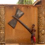 At the Chameleon Temple in Abomey, a young boy proudly posed for us (image by Ingrid Koedood)