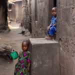 In the narrow alleyways of Agonvé, we met these two curious little souls (image by Ingrid Koedood)