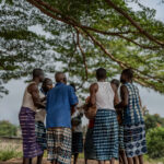 Calabash Players Dressed in Indigo (Kita) Cloth (Image by Craig Baulcomb)
