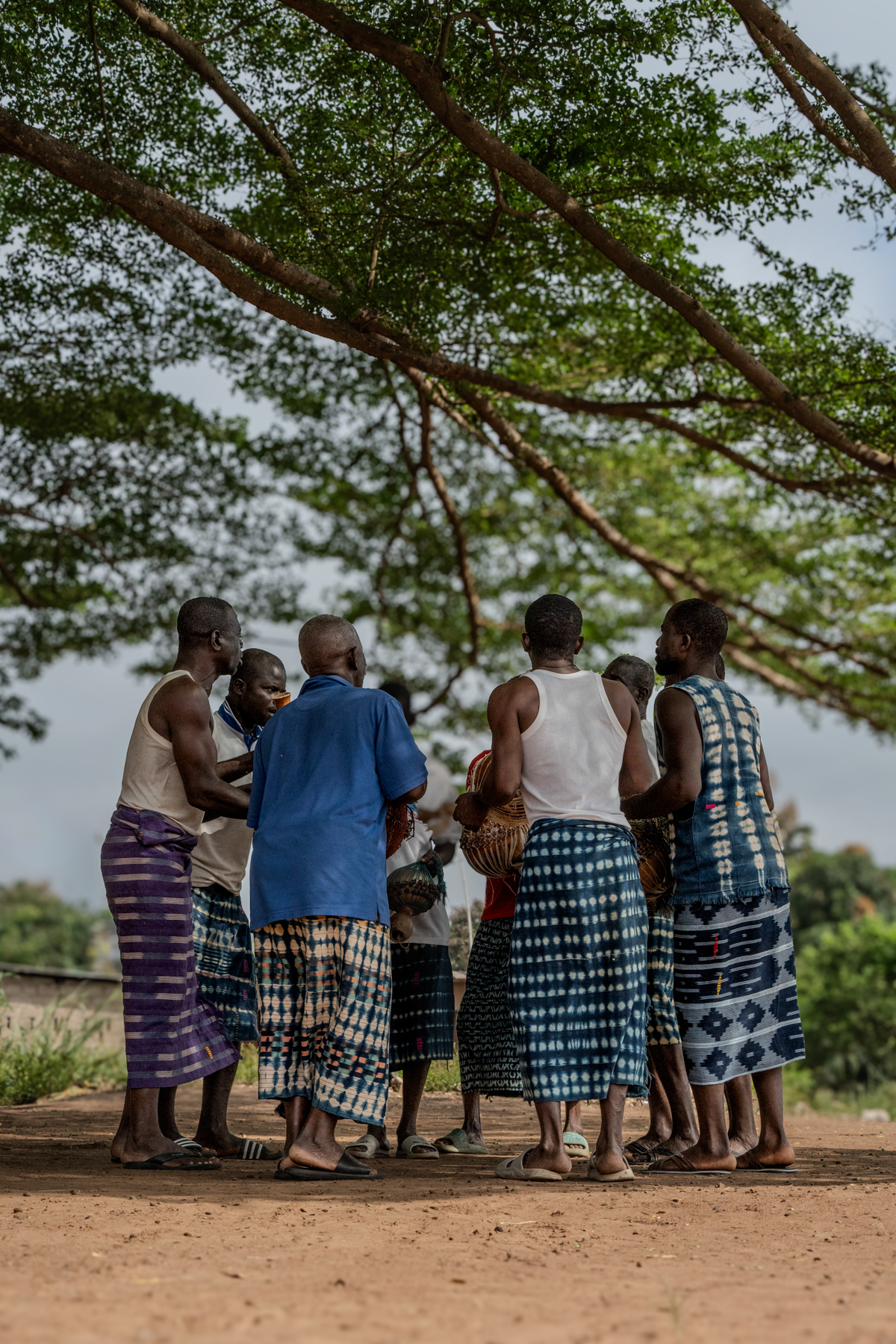 Calabash Players Dressed in Indigo (Kita) Cloth (Image by Craig Baulcomb)