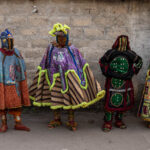 Egungun dancers. During the Egungun ceremony, masked performers embody ancestral spirits, bringing blessings, protection and guidance to the community (image by Ingrid Koedood)