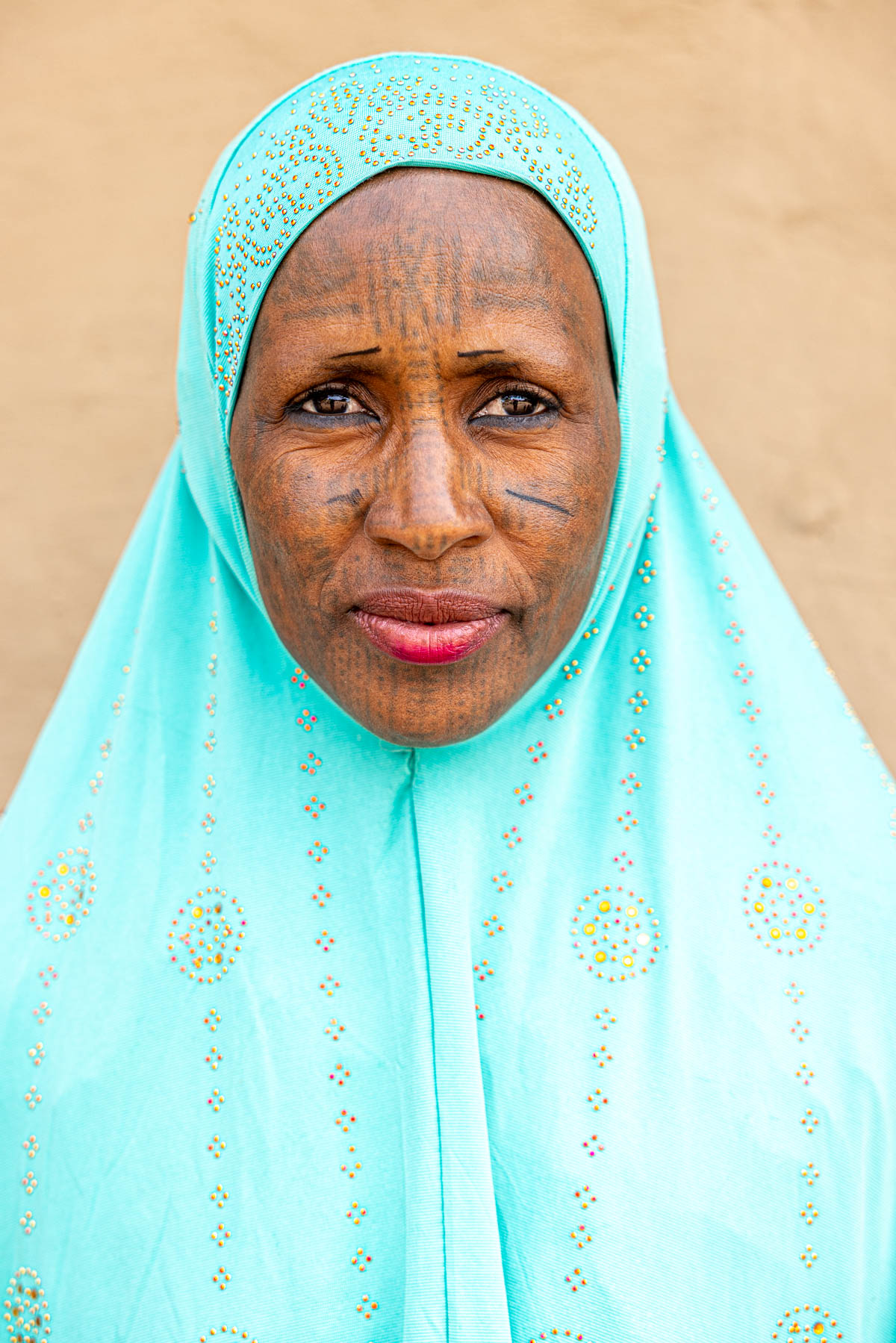 Portrait of a Borgu Fulani woman with traditional facial tattoos (image by Ingrid Koedood)