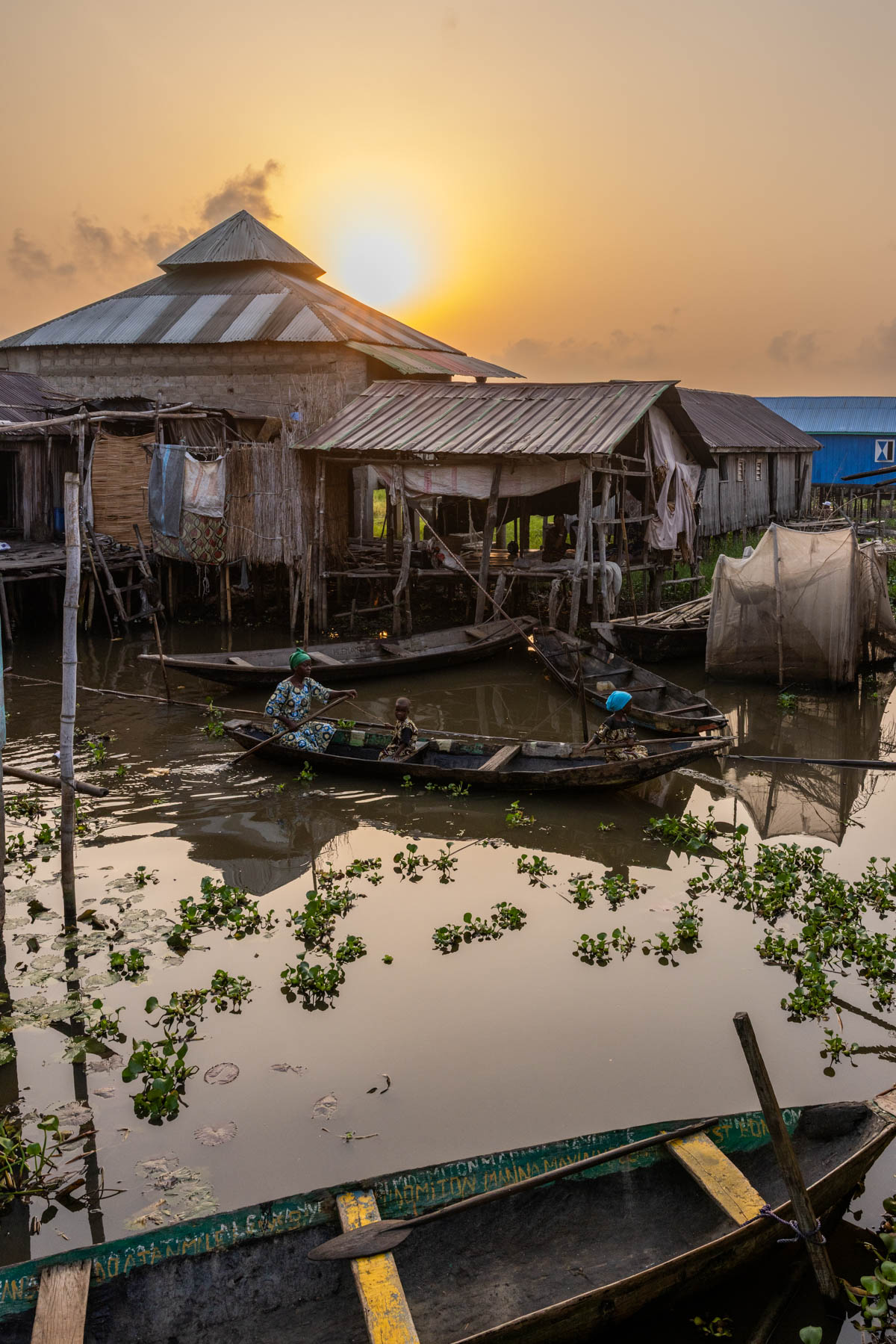 Daily life early in the morning in Ganvié, the Venice of Africa (image by Ingrid Koedood)