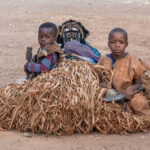 Gba masked dancer with young initiate boys (image by Inger Vandyke)