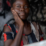 Lost in Thought in Old Grand Bassam (Image by Craig Baulcomb)