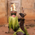 Early in the morning we attended a masked performance with fire as part of the Guèlèdè ceremony (image by Ingrid Koedood)