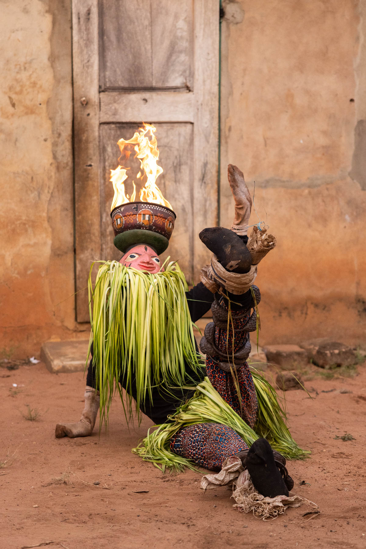 Early in the morning we attended a masked performance with fire as part of the Guèlèdè ceremony (image by Ingrid Koedood)