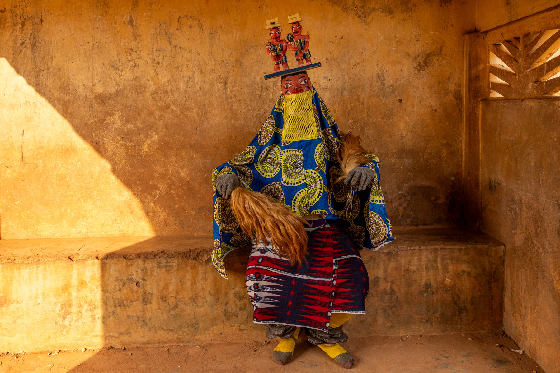 A Guèlèdè performer. Guèlèdè is a Yoruba masked ceremony honouring the power of women and bringing harmony to the community (image by Ingrid Koedood)