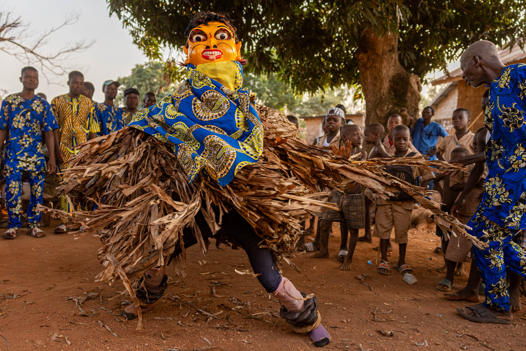 A whirlwind of raffia and colour during the Guèlèdè masquerade (image by Ingrid Koedood)