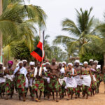 By chance we encountered a Heviosso ceremony. The community was on his way, and we were warmly invited to join (image by Ingrid Koedood)