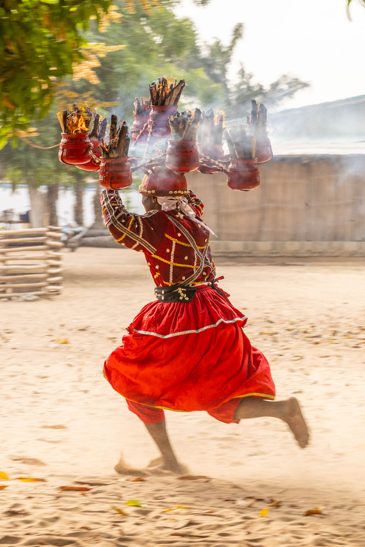 A Heviosso devotee running with a flaming headpiece during the fire ceremony (image by Ingrid Koedood)