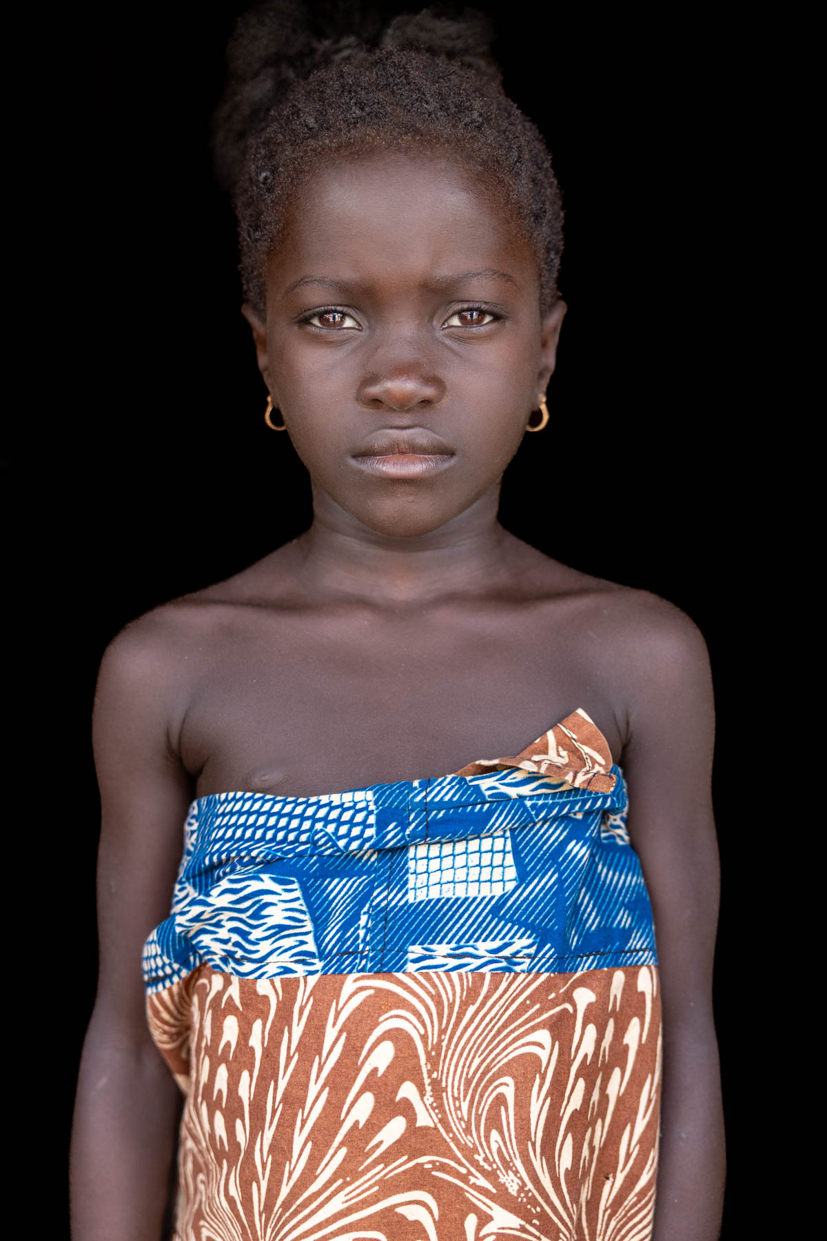 Portrait of a young girl of the Holi tribe (image by Ingrid Koedood)