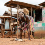 A Jongleur girl makes an offering before she starts to dance (image by Inger Vandyke)