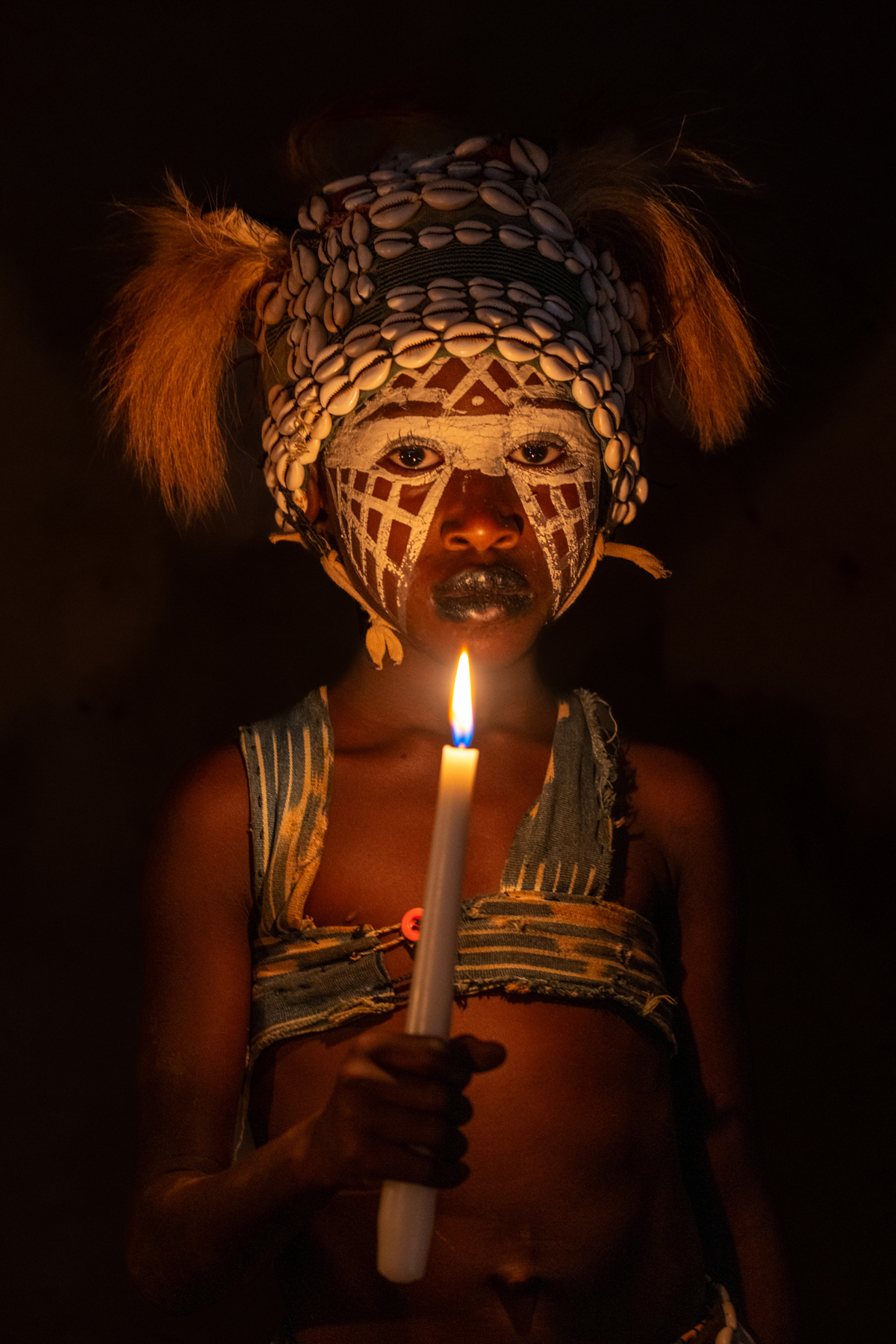 Jongleur girl with candle (image by Inger Vandyke)