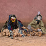 Gla masked dancers taking a break (image by Inger Vandyke)