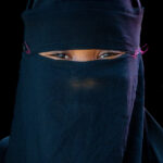 Muslim girl wearing Niqab in Man (image by Inger Vandyke)
