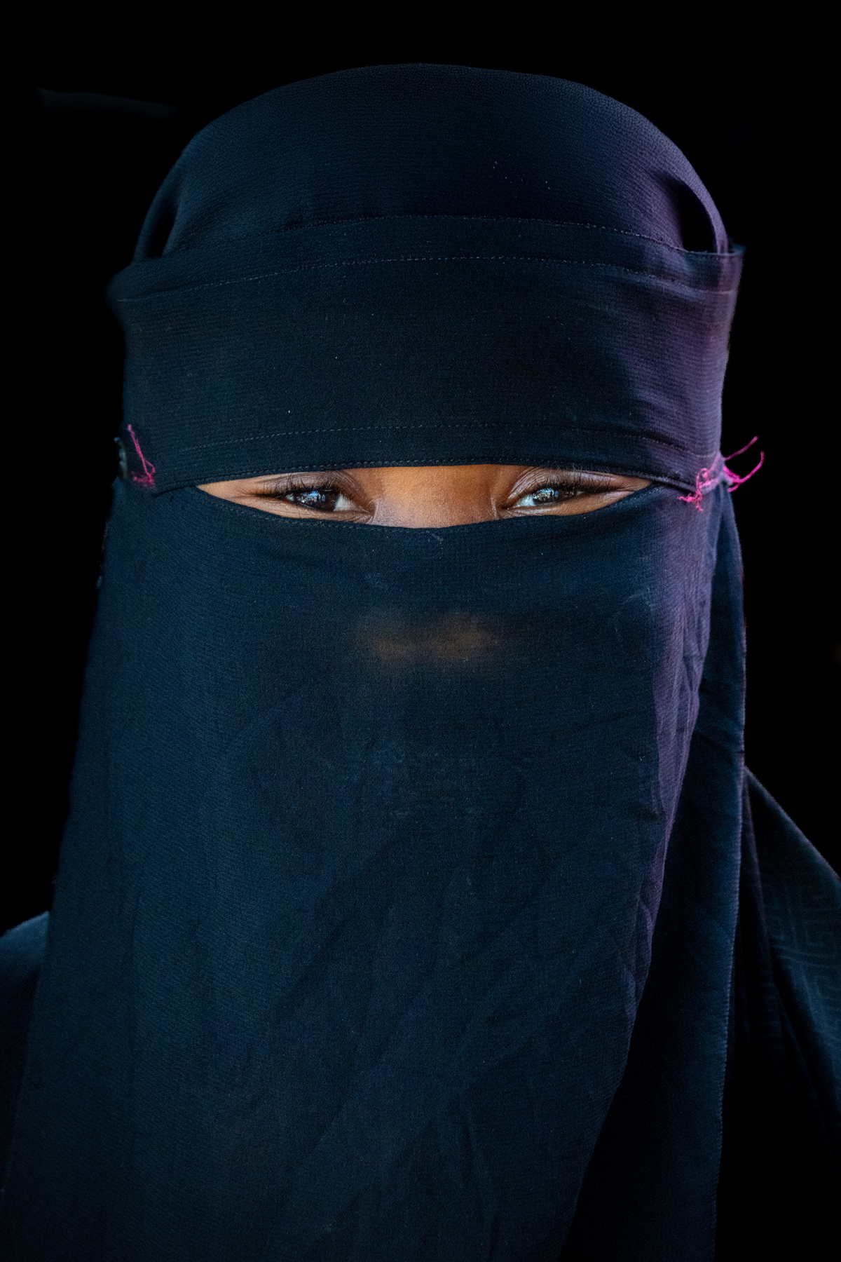 Muslim girl wearing Niqab in Man (image by Inger Vandyke)