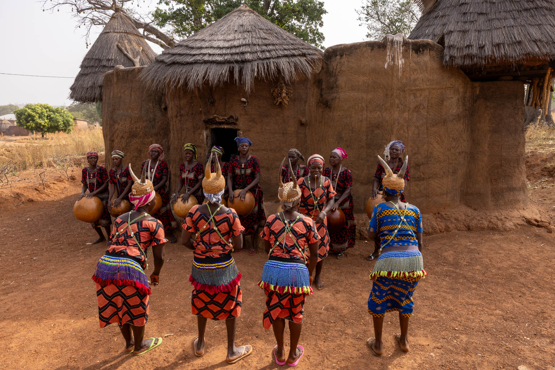 Traditional Otamari dance in front of a tata (image by Ingrid Koedood)