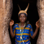 Otamari woman standing in the doorway of a tata (image by Ingrid Koedood)