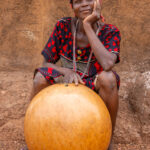 An Otamari woman with her calabash: a simple object, a powerful sound (image by Ingrid Koedood)