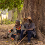 Otamari elders sharing a quiet moment. She still wears a traditional stone labret (lip plug) (image by Ingrid Koedood)