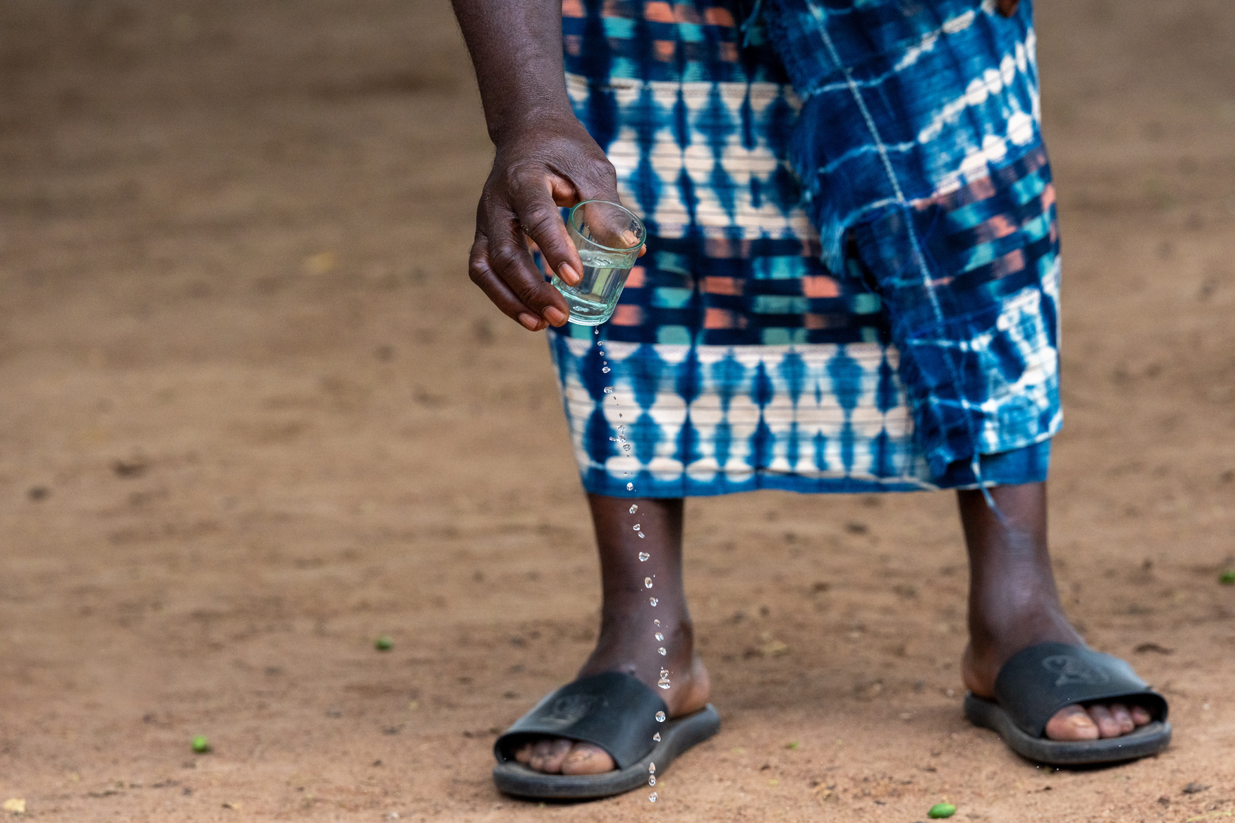 Pouring libations ahead of a Goly ceremony (image by Inger Vandyke)