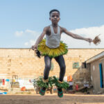 Zaouli trainee in mid-air (image by Inger Vandyke)