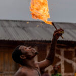 During the Zangbeto ceremony, a performer spits fire, turning ritual into spectacle (image by Ingrid Koedood)