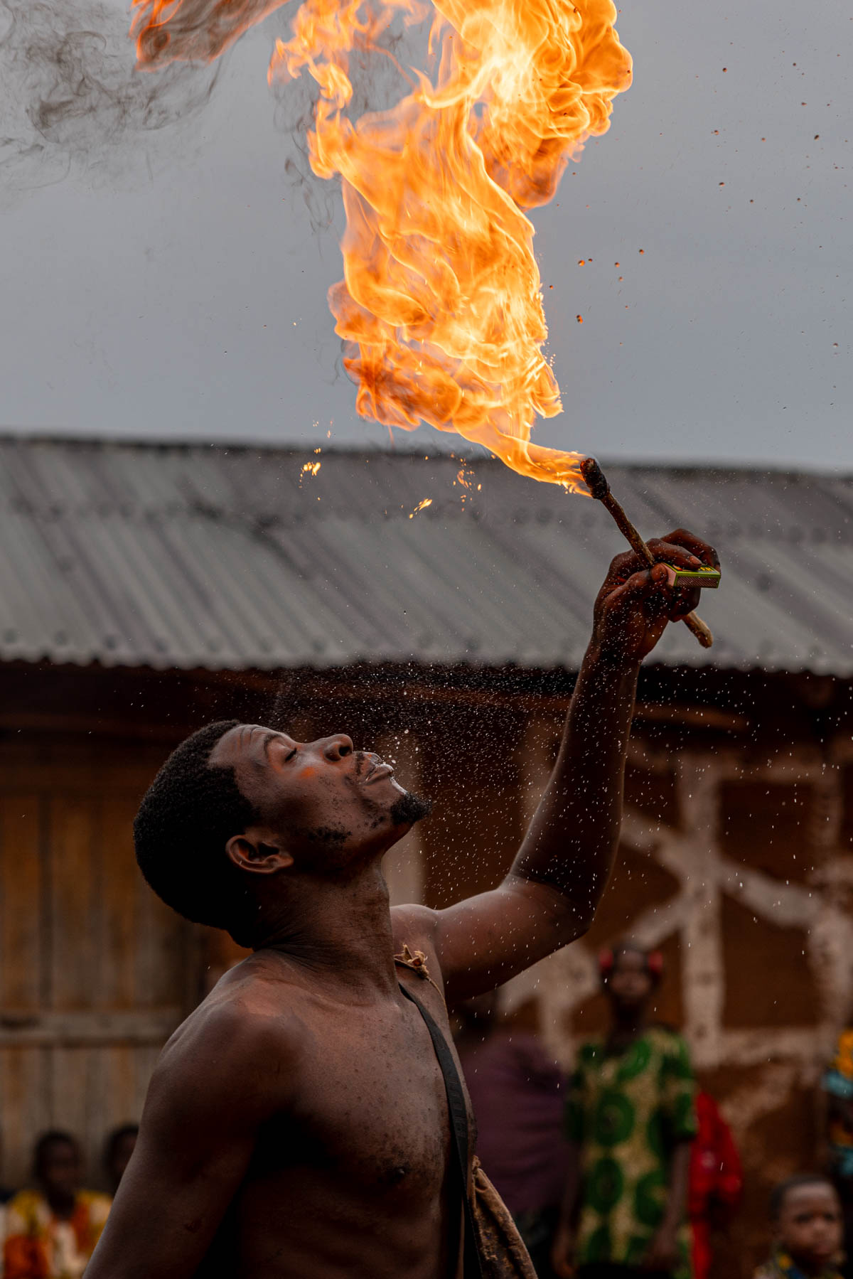 During the Zangbeto ceremony, a performer spits fire, turning ritual into spectacle (image by Ingrid Koedood)