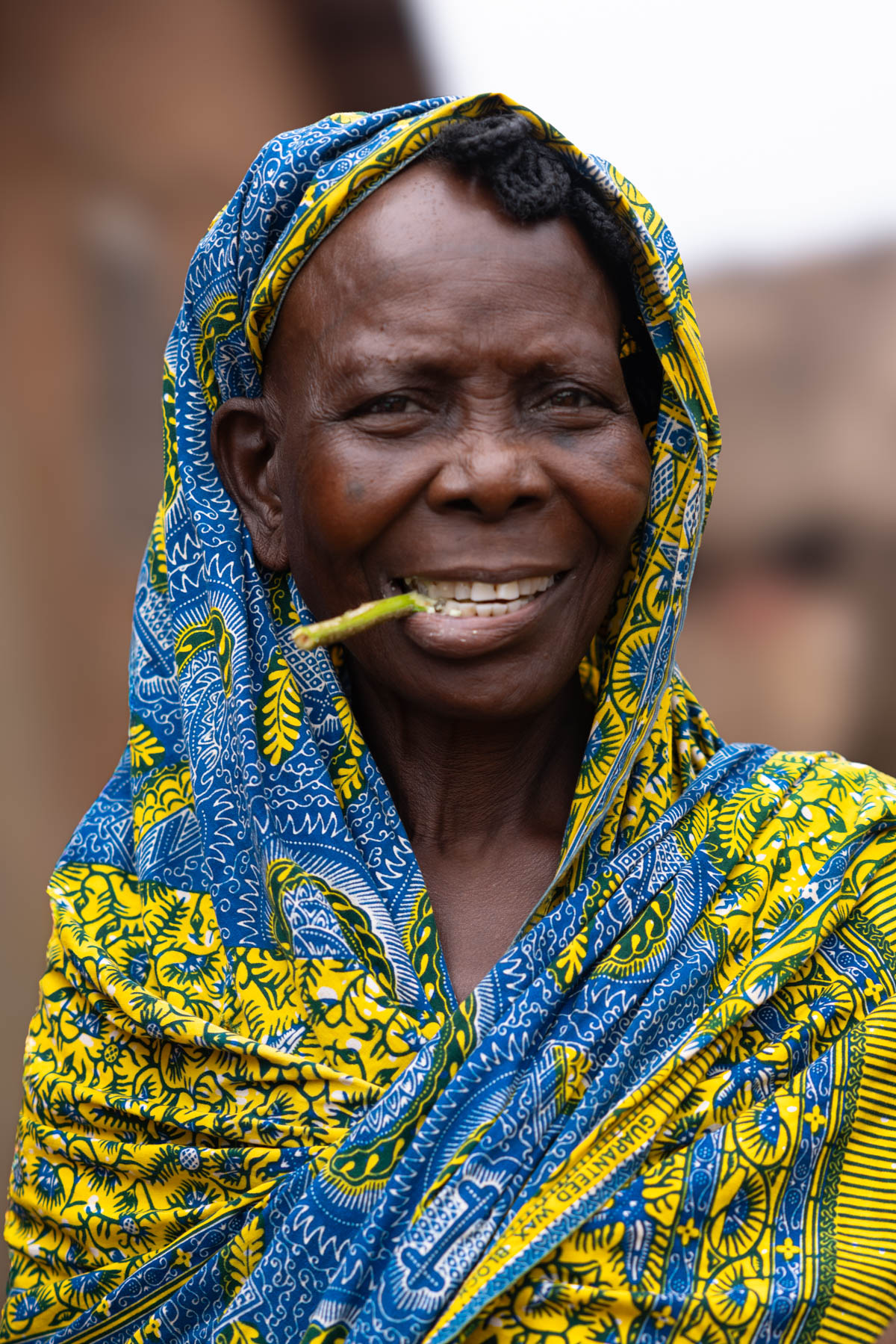 Portrait of a woman watching the Zangbeto ceremony (image by Ingrid Koedood)