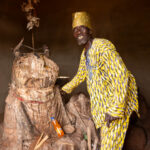 An elderly priest inside the Zangbeto shrine (image by Ingrid Koedood)