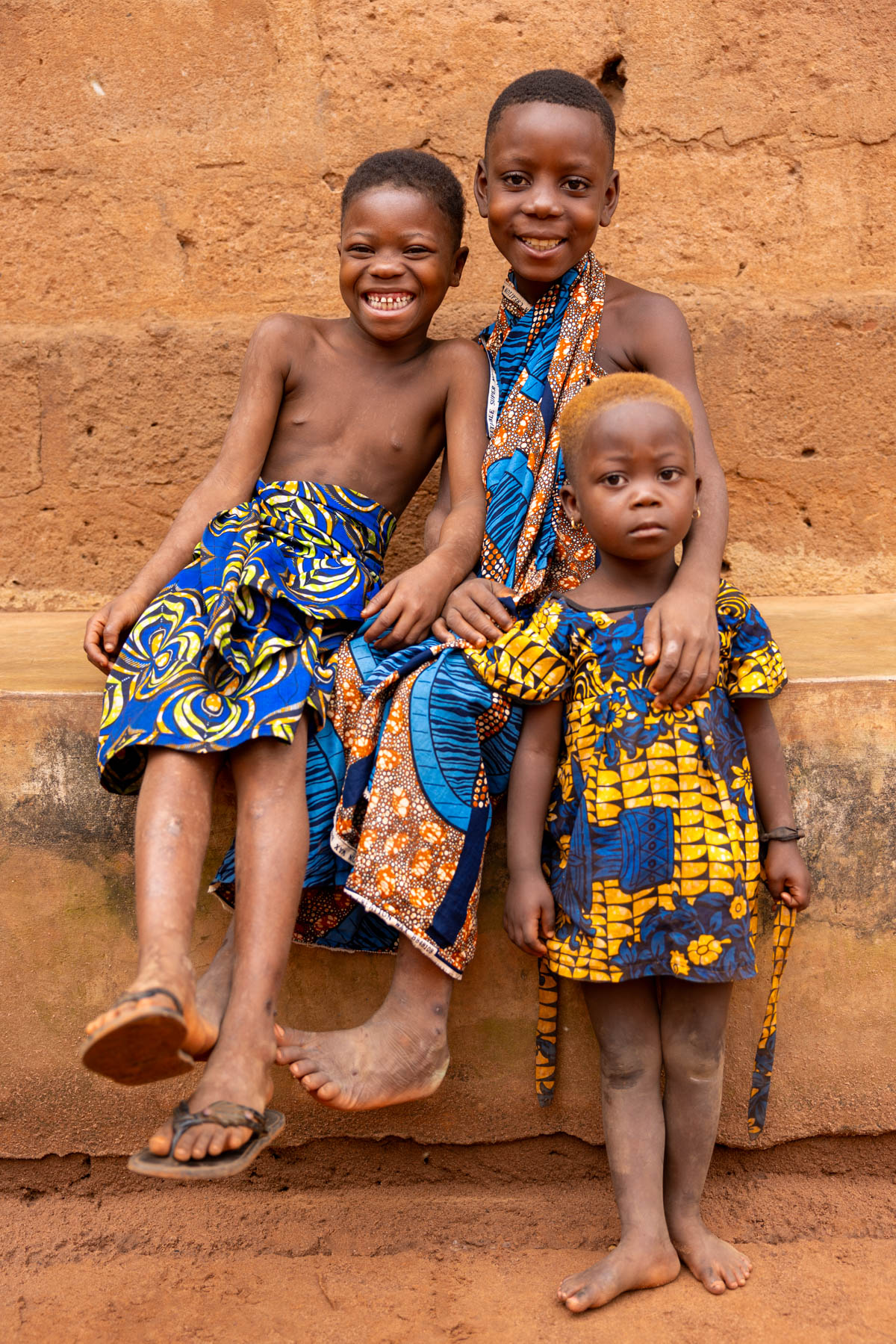 Between the rituals and the drums of a Zangbeto ceremony, the children asked to be photographed (image by Ingrid Koedood)