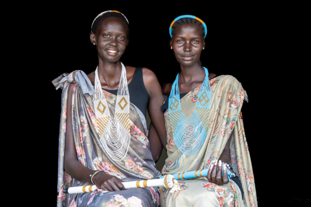 Beautiful Aker and Nyanda in traditional Dinka wedding attire (image by Inger Vandyke)