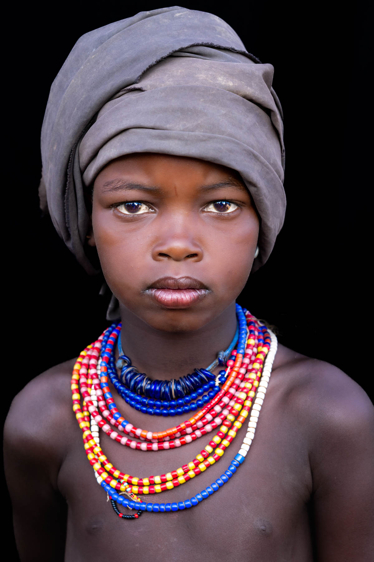 A beautiful young Arbore girl posing with grace. (image by Ingrid Koedood)