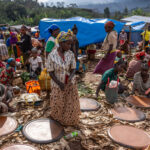 At the vibrant Ari market, handmade plates are sold for preparing and serving injera. (image make by Ingrid Koedood)
