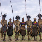 After the Dimi ceremony, Dassanech men and women stand in their tradtional attire. (image by Ingrid Koedood)