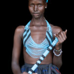 Aker with Dinka wedding beads (image by Inger Vandyke)