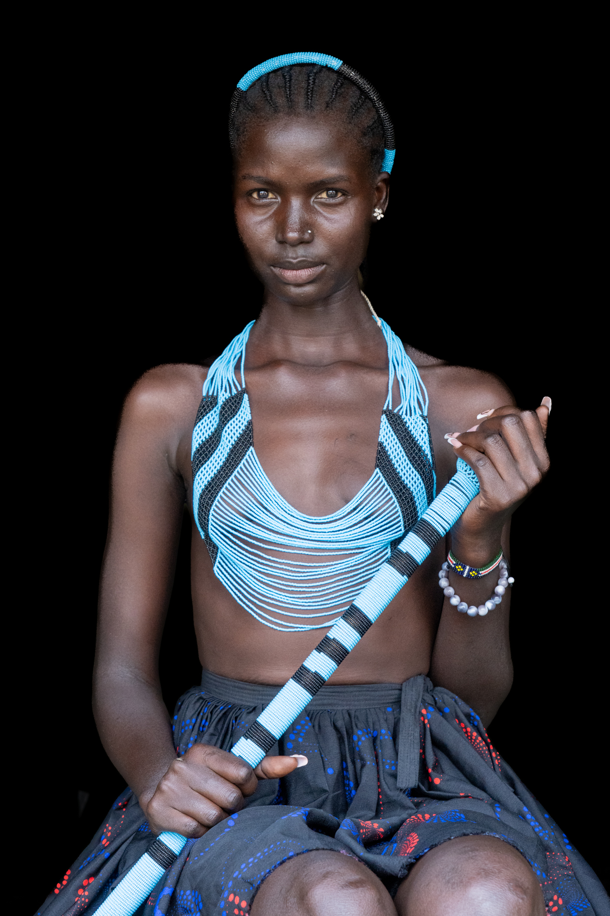 Aker with Dinka wedding beads (image by Inger Vandyke)