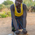 Grinding fresh peanut butter - delicious! (image by Inger Vandyke)