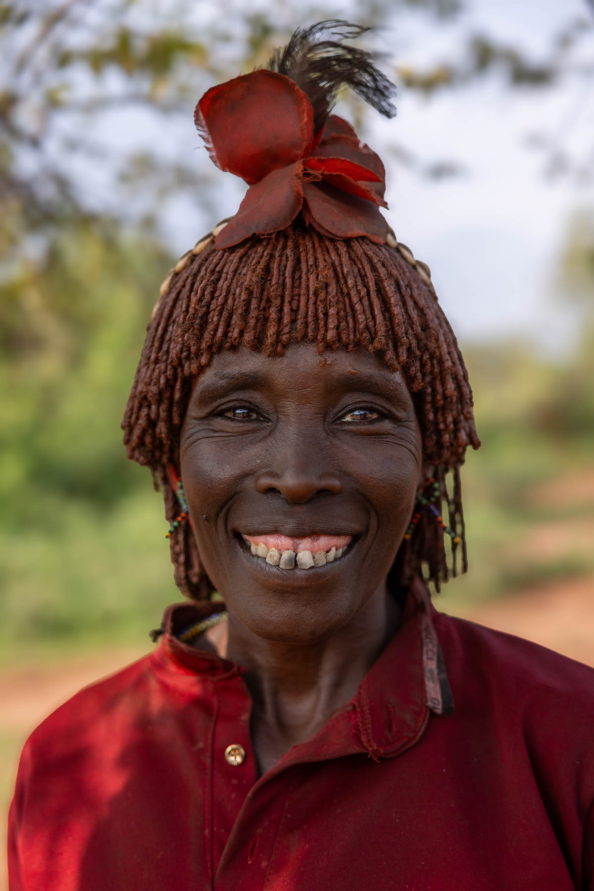 This Hamar woman gave the camera a big smile. (image by Ingrid Koedood)