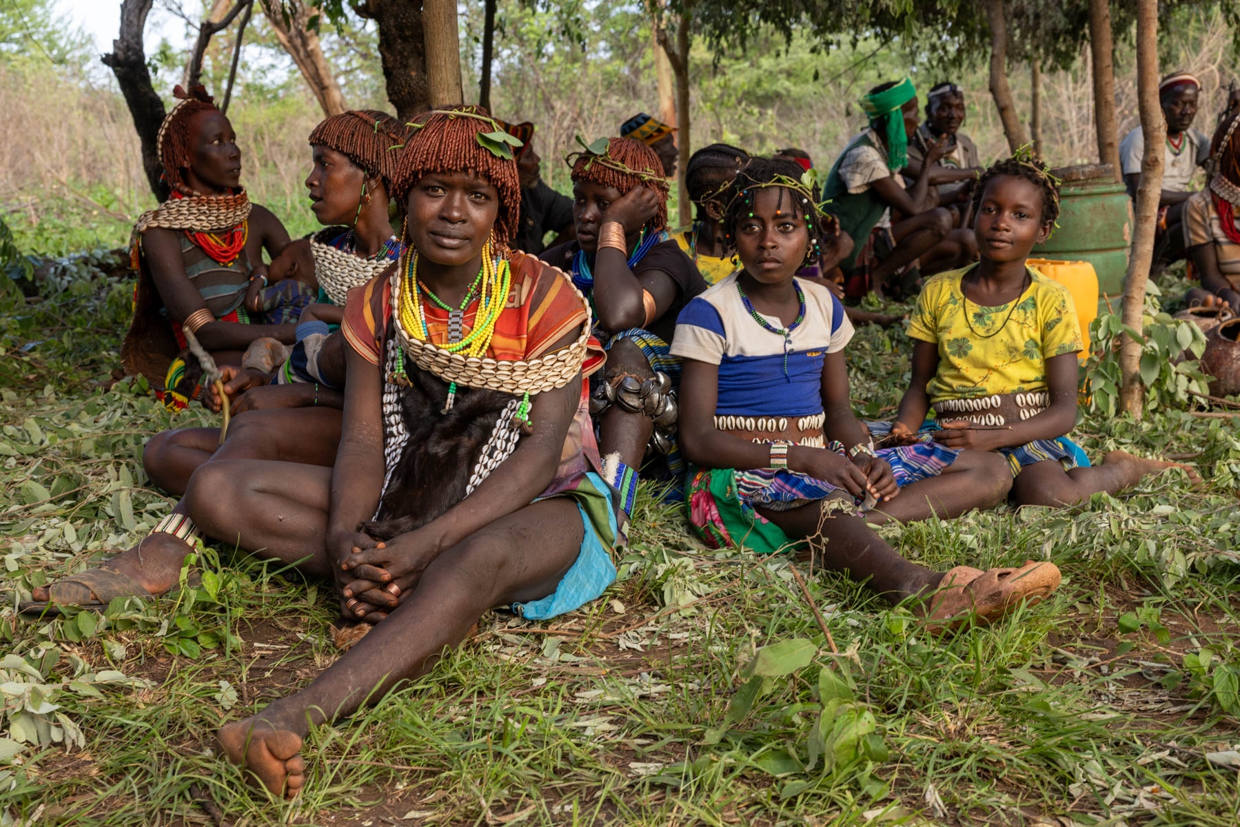 The Hamar people were waiting in the shade during the bull jumping ceremony. (image by Ingrid Koedood)